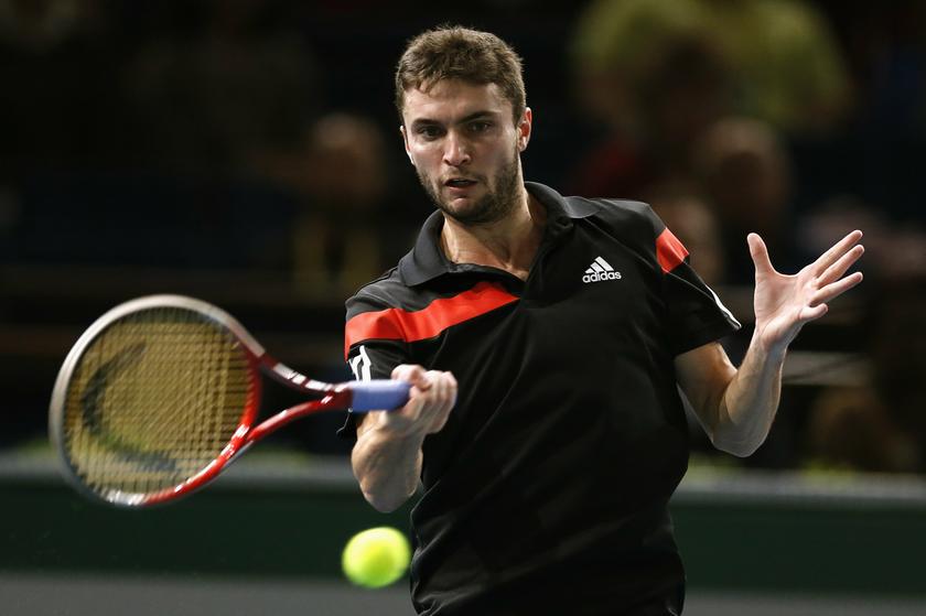 Gilles Simon of France returns a shot to David Ferrer of Spain during their men's singles match at the Paris Masters tennis tournament in Palais Omnisports of Bercy in Paris, October 31, 2013. u00e2u20acu201d Reuters pic