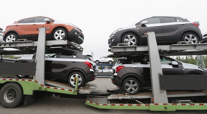 Cars made by GM Korea are seen on trucks in a yard of GM Koreau00e2u20acu2122s Bupyeong plant before they are transported to a port for export, in Incheon, west of Seoul August 9, 2013. u00e2u20acu201d Reuters pic