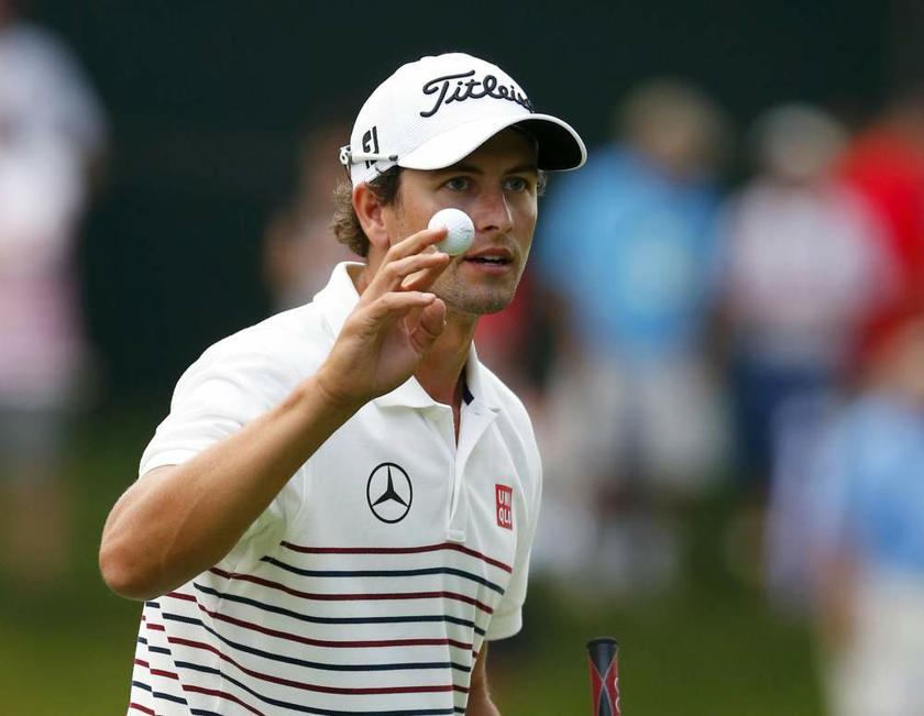 Australiau00e2u20acu2122s Adam Scott reacts after putting on the 18th green during the first round of the 2013 PGA Championship golf tournament at Oak Hill Country Club in Rochester, New York on August 8, 2013. u00e2u20acu201d Reuters pic