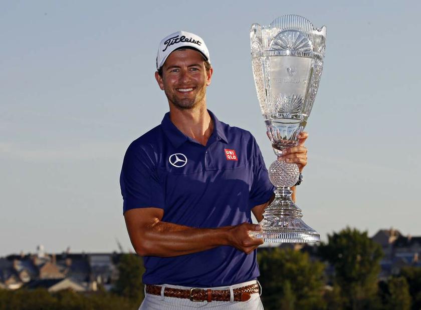 Adam Scott of Australia poses with the trophy after winning the Barclays PGA golf tournament in Jersey City, New Jersey, on August 25, 2013. u00e2u20acu201d Reuters pic
