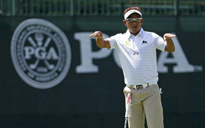 Thailandu00e2u20acu2122s Thongchai Jaidee gestures as he looks at his putt on the fifth green during a practice round for the 2013 PGA Championship golf tournament at Oak Hill Country Club in Rochester, New York on August 6, 2013. u00e2u20acu201d Reuters pic