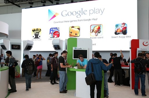 Attendees visit the Google Play booth during the Google I/O developers conference at the Moscone Centre on May 15, 2013 in San Francisco, California. — AFP pic