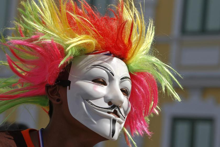 A man wears a colourful wig and Gay Fawkes mask as he join thousands gathering in a protest against the amnesty bill in central Bangkok November 11, 2013. u00e2u20acu201d Reuters pic