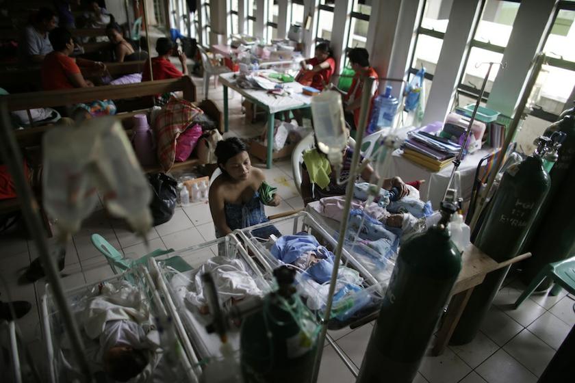 Newborn babies lie in cribs inside a chapel which was turned into a makeshift hospital after Super Typhoon Haiyan battered Tacloban city in central Philippines November 13, 2013. u00e2u20acu201d Reuters pic
