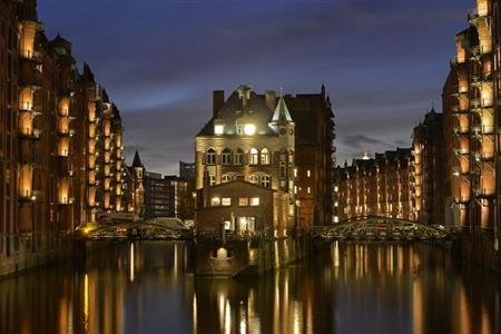 The u00e2u20acu02dcWater Castleu00e2u20acu2122 (centre) in the famous old warehouse district of Speicherstadt in Hamburg is a must-see when in the city. u00e2u20acu201d Reuters pic