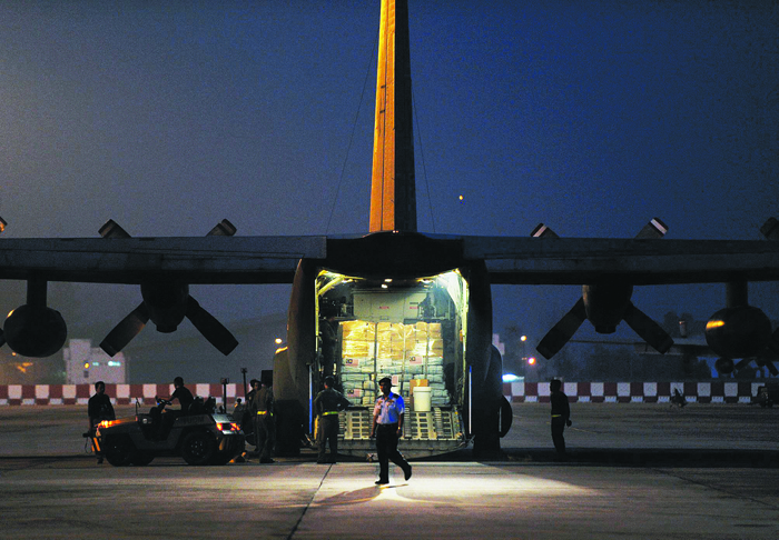 A humanitarian mission from Kelab Putra 1Malaysia and the Malaysian army loads food and medicine to help victims of Typhoon Haiyan at the RMAF base in Subang yesterday. u00e2u20acu201du00c2u00a0Picture by Arif Kartono