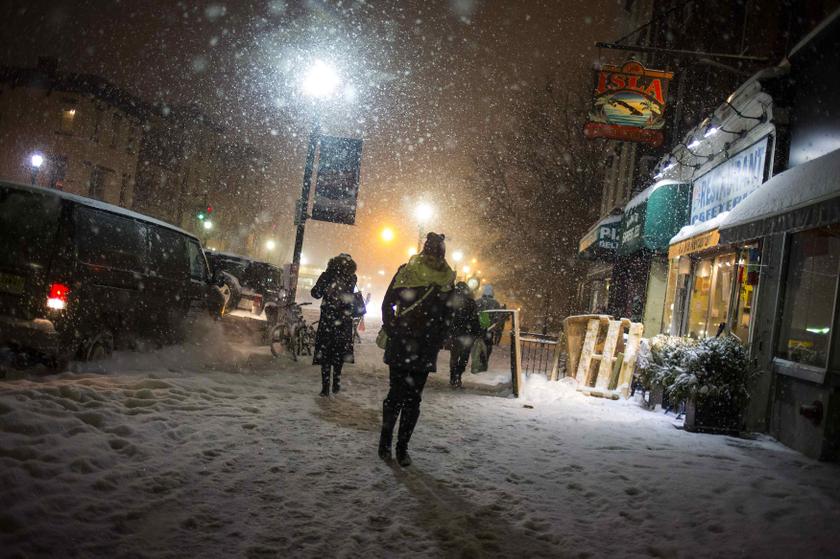 People walk through the snow in Hoboken, New Jersey January 21, 2014.u00c2u00a0u00e2u20acu201d Reuters pic