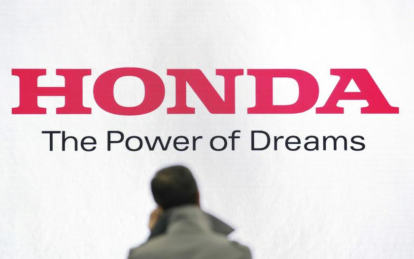 A man stands in front of a logo of Honda Motor at the company showroom in Tokyo January 31, 2013. u00e2u20acu201d Reuters pic 