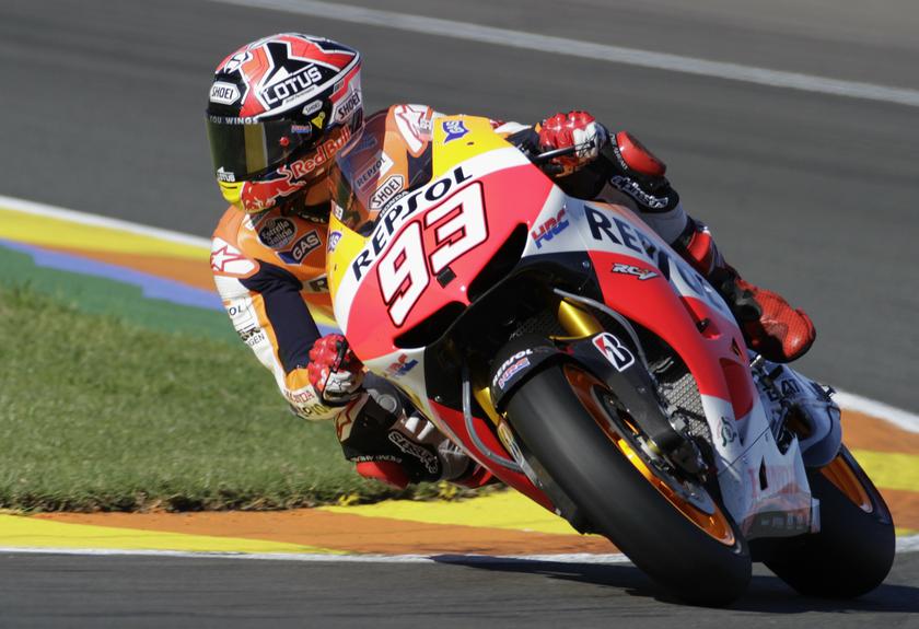 Honda MotoGP rider Marc Marquez of Spain races to win the pole position during the qualifying session ahead of the Valencia Motorcycle Grand Prix at the Ricardo Tormo racetrack in Cheste, near Valencia, November 9, 2013. u00e2u20acu201d Reuters pic