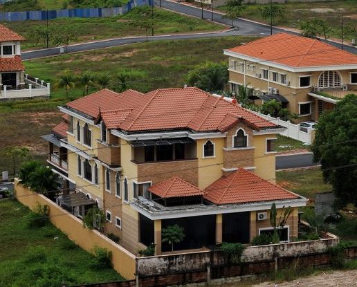 File photo of houses under-construction in Kuala Lumpur. u00e2u20acu201d AFP pic