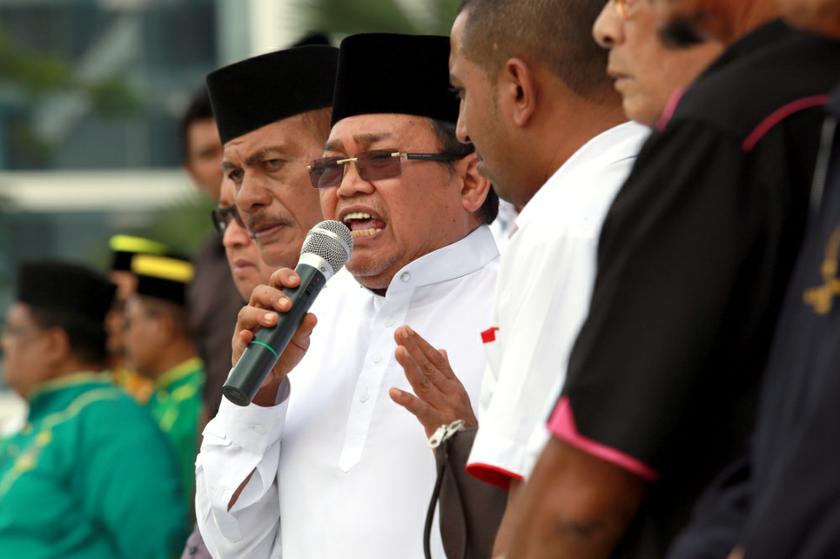 Ibrahim Ali speaks at a Perkasa rally outside the Court of Appeal in Putrajaya on October 14, 2013 before the court ruling on the u00e2u20acu02dcAllahu00e2u20acu2122 appeal. u00e2u20acu201d Picture by Saw Siow Feng