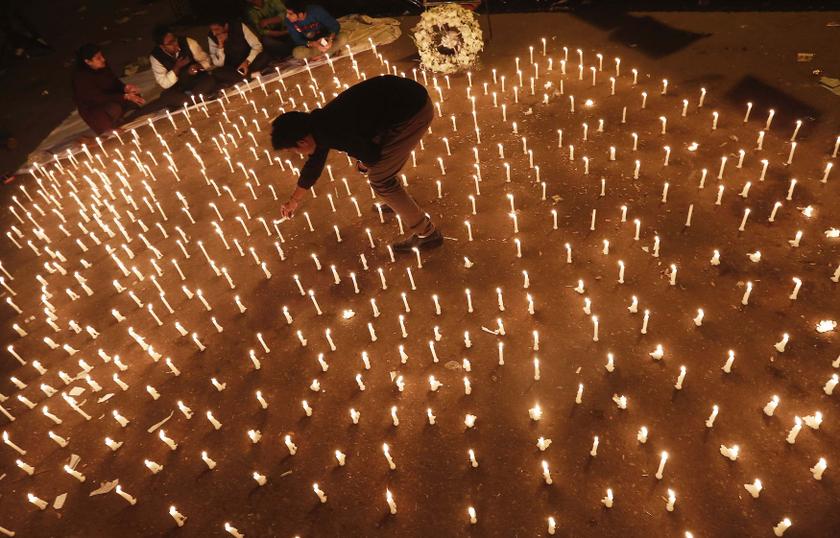 A protester lights candles during a candlelight vigil to mark the first anniversary of the Delhi gang rape, in New Delhi December 16, 2013. u00e2u20acu201d Reuters pic