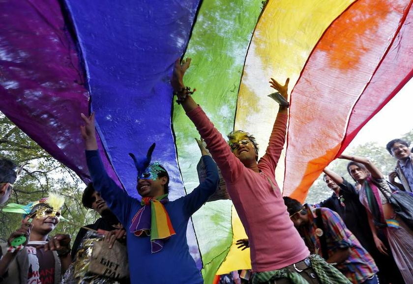 Participants dance under a a rainbow flag as they attend the sixth Delhi Queer Pride parade, an event promoting gay, lesbian, bisexual and transgender rights, in New Delhi November 24, 2013. u00e2u20acu201d Reuters pic