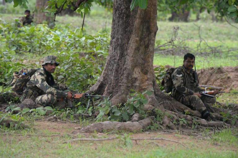 Central Reserve Police Force (CRPF) personnel mount a patrol outside the village of Kothaguda in Bijapur District on July 7, 2012, after an encounter between Maoist rebels and security forces in the central Indian state of Chhattisgarh. u00e2u20acu201d AFP pic
