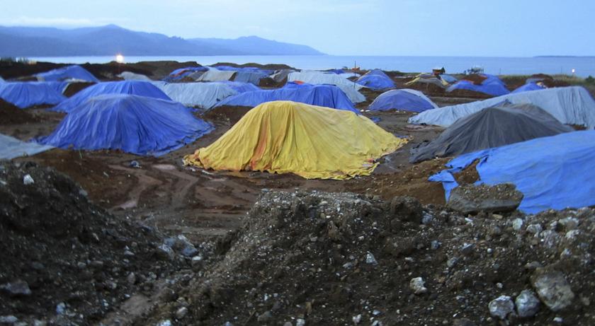 Stockpiles of nickel ore await shipment at a port in a nickel-mining area in Indonesiau00e2u20acu02dcs central Sulawesi in this July 8, 2012 file photo. u00e2u20acu201d Reuters pic