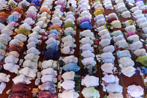 Indonesian Muslims hold prayers on the first night of the holy month of Ramadan at the Istiqlal mosque in Jakarta on July 9, 2013. u00e2u20acu201d AFP pic