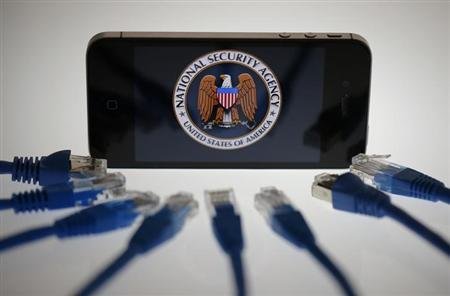An illustration picture shows the logo of the US National Security Agency on the display of an iPhone in Berlin on June 7, 2013. u00e2u20acu201d Reuters pic