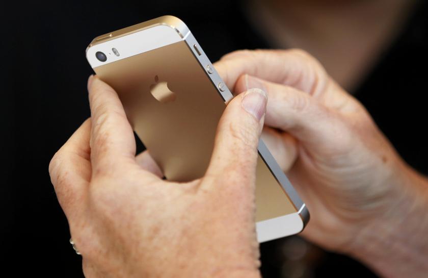 The gold coloured version of the new iPhone 5S is displayed after Apple Inc's media event in Cupertino, California Sept 10, 2013. u00e2u20acu201d Reuters pic