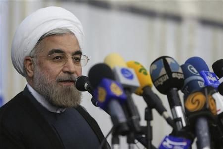 Moderate cleric Hassan Rouhani takes office Iran president August 3, 2013