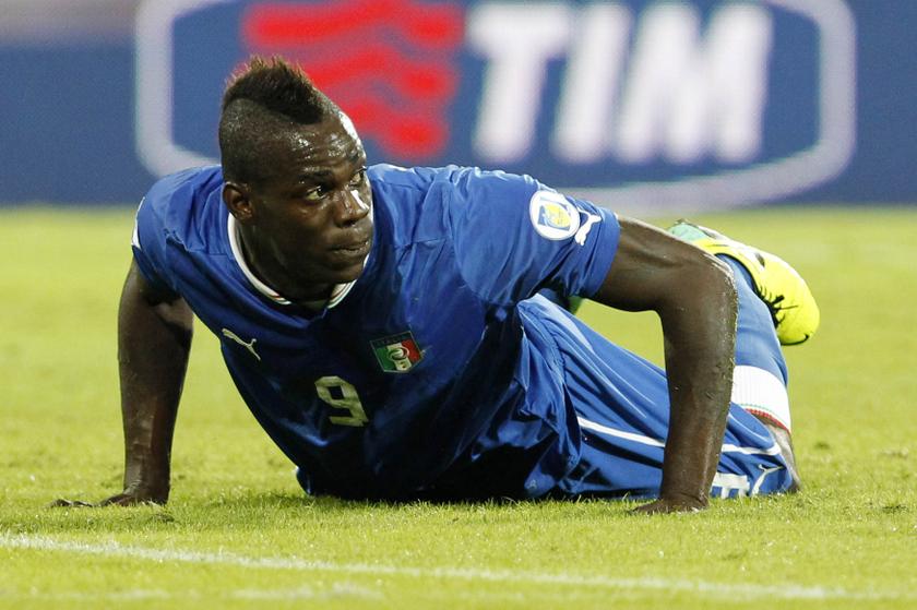Italy's Mario Balotelli lies on the field during their 2014 World Cup qualifying match against Armenia at San Paolo stadium in Naples October 15, 2013. u00e2u20acu201d Reuters pic