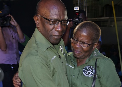 Former FIFA Vice President Jack Warner embraces his wife Maureen during the celebration of his victory in a by-election for a constituency seat in Parliament, from which he had resigned last April, in Charlieville July 29, 2013. u00e2u20acu201d Reuters pic