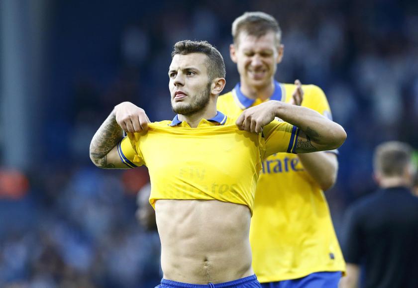 Arsenal's Jack Wilshere takes off his shirt after their English Premier League match against West Bromwich Albion at The Hawthorns in West Bromwich, central England, October 6, 2013. u00e2u20acu201d Reuters pic