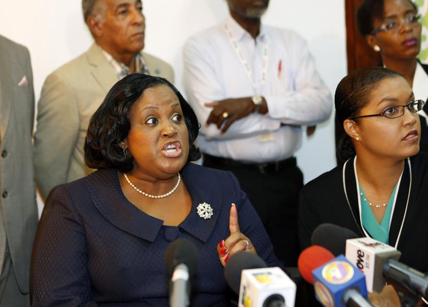 Jamaica's minister with responsibility for sports Natalie Neita-Headley (left) speaks during a news conference following a visit from officials of the World Anti-Doping Agency in Kingston, October 30, 2013. u00e2u20acu201d Reuters pic