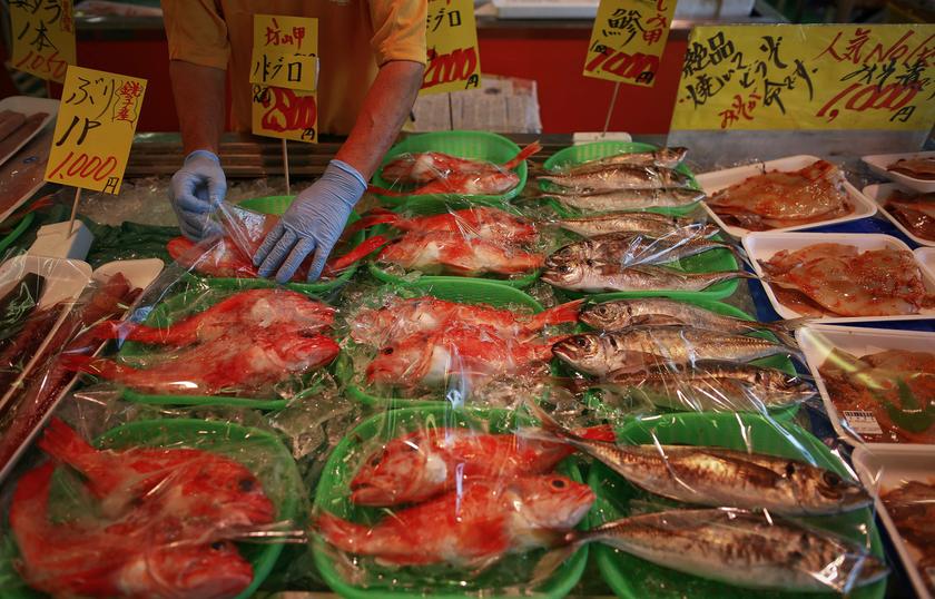 A vendor offers fish for sale at a market in the Iwaki town, south of the tsunami-crippled Daiichi nuclear power plant in Fukushima prefecture September 19, 2013. u00e2u20acu201d Reuters pic