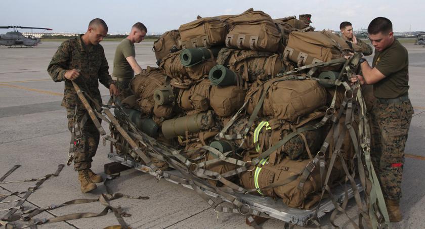 Marines preparing items for humanitarian assistance and disaster relief mission to the Philippines at the US Futenma airbase in Ginowan, Okinawa, November 10, 2013 in this handout provided by US Marine Corps. u00e2u20acu201d Reuters pic