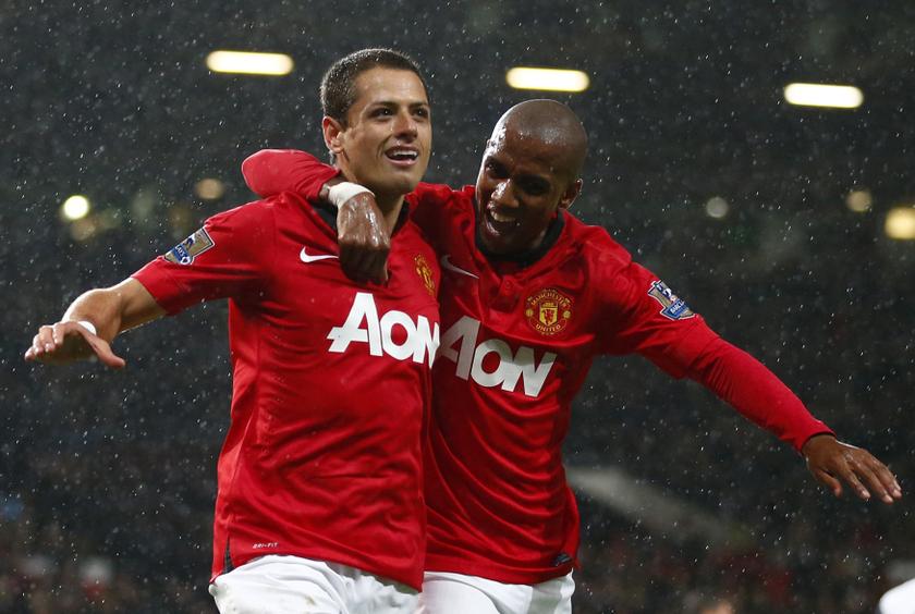 Manchester United's Javier Hernandez celebrates his goal against Norwich City with Ashley Young (right) during their English League Cup fourth round match at Old Trafford in Manchester, northern England, October 29, 2013. u00e2u20acu201d Reuters pic