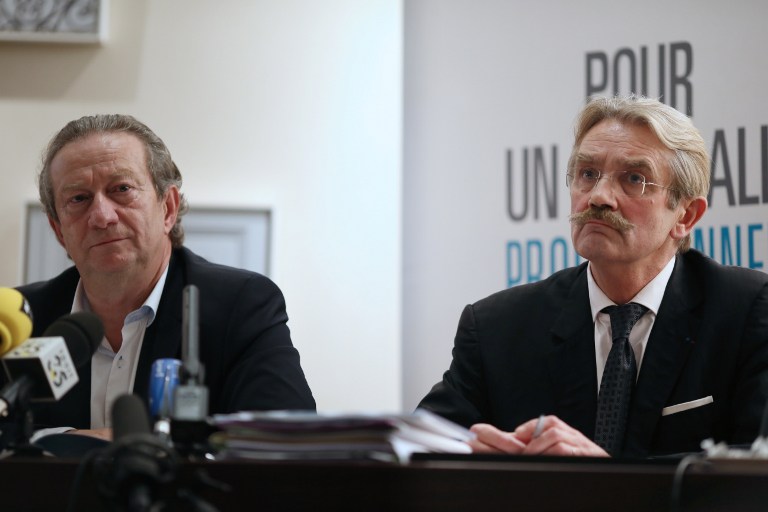 The president of the French professional clubs union (UCPF), Jean-Pierre Louvel (left), and the president of the professionnal French football league (LFP), Frederic Thiriez, give a press conference on October 24, 2013 in Paris. u00e2u20acu201d AFP pic