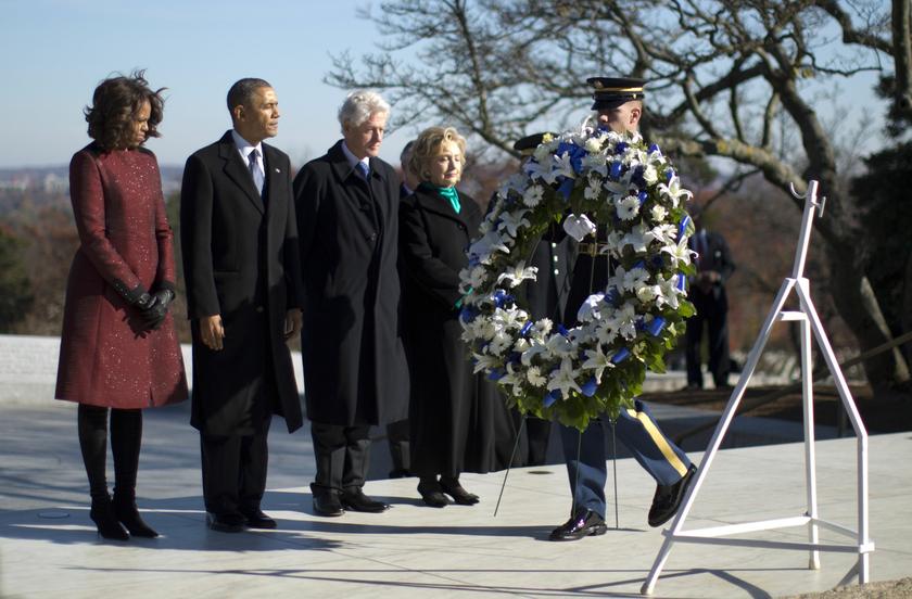 US President Barack Obama, first lady Michelle Obama, former President Bill Clinton (3rd left) and Hillary Clinton participate in a wreath laying in honour of assassinated US President John F. Kennedy at Arlington National Cemetery, near Washington, Novem