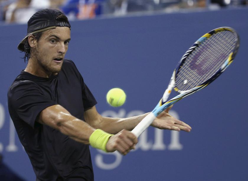 Joao Sousa of Portugal returns a backhand to Novak Djokovic of Serbia at the US Open tennis championships in New York, September 1, 2013. u00e2u20acu201d Reuters pic