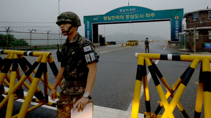 A South Korean soldier walks at a military checkpoint leading to North Korea's Kaesong joint industrial complex, in the border city of Paju early on July 10, 2013. u00e2u20acu201d AFP pic