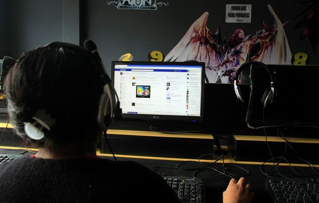 A Facebook user browses at a public Internet service. Reuters file