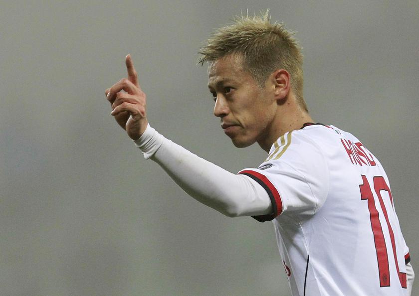 AC Milan's Keisuke Honda gestures during their Italian Serie A soccer match against Sassuolo at the Mapei stadium in Reggio Emilia January 12, 2014. u00e2u20acu201d Reuters