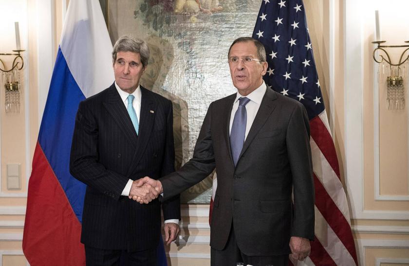 US Secretary of State John Kerry (left) and Russian Foreign Minister Sergei Lavrov shake hands before a meeting in Munich January 31, 2014. u00e2u20acu2022 Reuters picn
