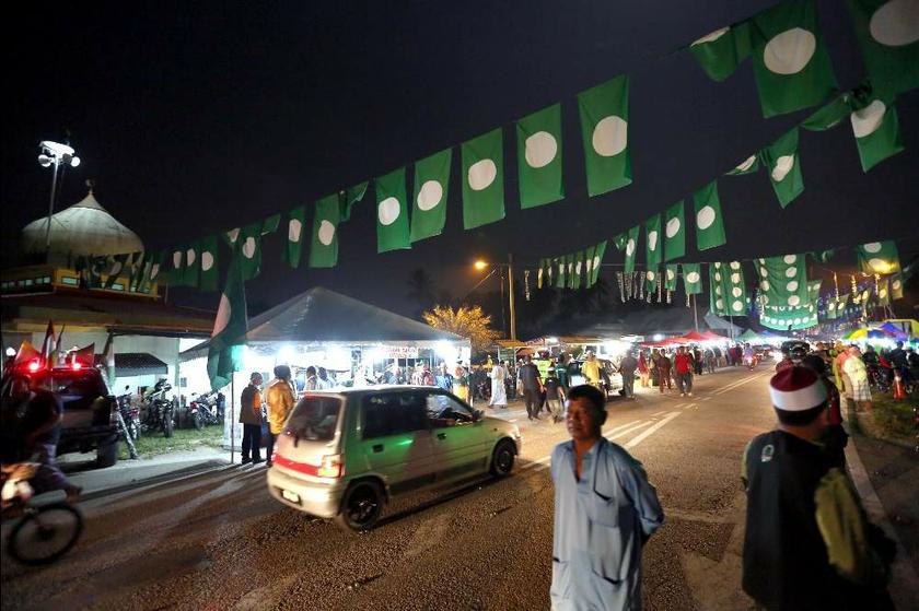 Kampung Tok Saboh in Kuala Besut is transformed into a carnival of sorts for the PAS ceramah held in the area on July 22, 2013. — Picture by Saw Siow Feng