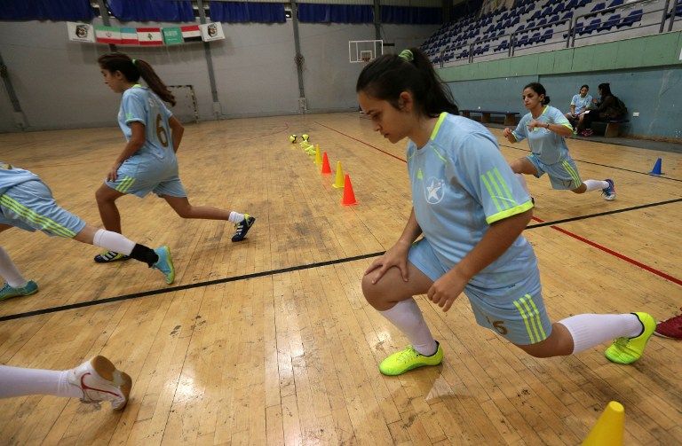 Players of the Stars Academy for Sports (SAS) futsal team attend a training session on November 27, 2013 in Beirut. u00e2u20acu2022 AFP pic
