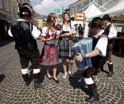 People wearing traditional costumes attend the 70th 'Kirchtag' Festival on August 3, 2013 in Villach, some 350 kilometers south-west of Vienna. u00e2u20acu201c AFP pic