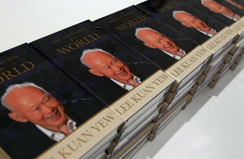 Copies of Singaporeu00e2u20acu2122s former Prime Minister Lee Kuan Yewu00e2u20acu2122s latest book u00e2u20acu02dcOne Man's View of the Worldu00e2u20acu2122 are displayed for sale at his book launch at the Istana in Singapore on August 6, 2013. u00e2u20acu201d Reuters pic