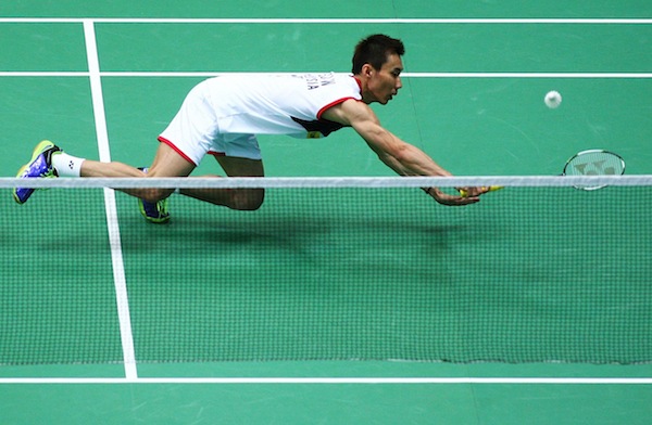 Malaysiau00e2u20acu2122s Lee Chong Wei reaches for a return to Chinau00e2u20acu2122s Lin Dan during their menu00e2u20acu2122s singles final at the 2013 Badminton World Championships in Guangzhou August 11, 2013. u00e2u20acu201d Reuters pic