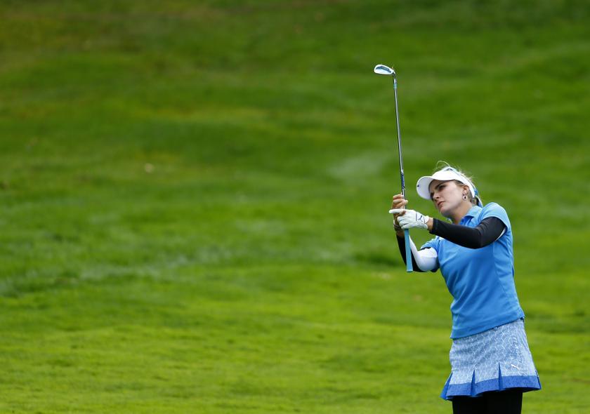 Lexi Thompson of the US watches her approach shot onto the 17th green during the final round of the women's Evian Championship golf tournament in Evian September 15, 2013. u00e2u20acu201d Reuters pic