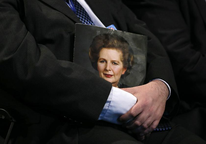 A delegate holds a portrait of Margaret Thatcher during a tribute to the former conservative prime minister on the opening day of The Conservative Party annual conference in Manchester, northern England September 29, 2013. u00e2u20acu201d Reuters pic