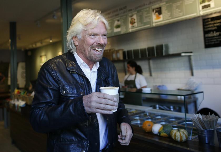 Sir Richard Branson buys a coffee before a seminar about the Virgin StartUp scheme for young entrepreneurs at Box Park, east London, October 24, 2013 Reuters pic