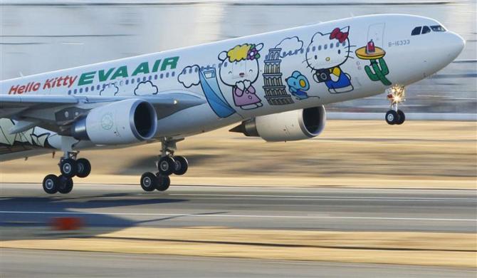 Eva Airways aircraft painted with Hello Kitty characters takes off at Narita international airport in Narita, east of Tokyo, in this photo taken by Kyodo December 26, 2011 Reuters pic