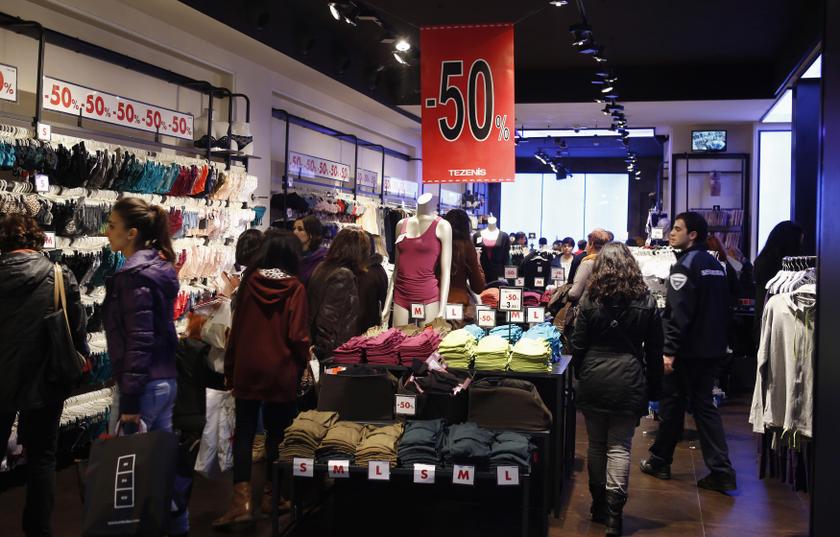 People visit a lingerie shop during winter sales in central Barcelona January 7, 2014. u00e2u20acu201dReuters pic