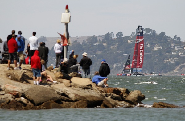 Spectators watch as Emirates Team New Zealand sails against Italyu00e2u20acu2122s Luna Rossa Challenge during the seventh race of the Louis Vuitton Cup challenger in San Francisco August 24, 2013. u00e2u20acu201d Reuters pic
