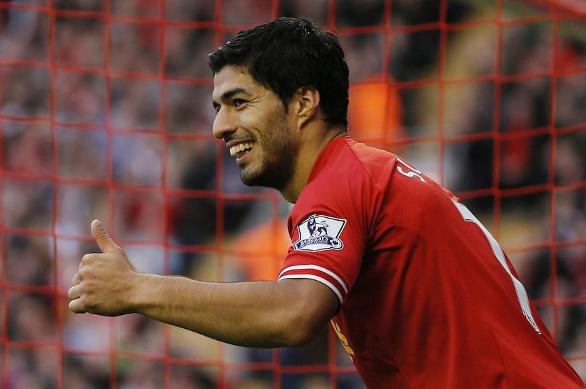 Liverpoolu00e2u20acu2122s Luis Suarez gestures during their English Premier League match against West Bromwich Albion at Anfield in Liverpool October 26, 2013. u00e2u20acu201d Reuters pic