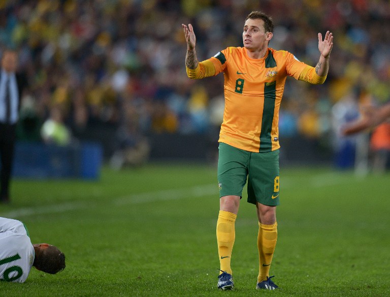 Luke Wilkshire (right) from Australia appeals to the referee during the World Cup qualifier against Iraq in Sydney on June 18, 2013. u00e2u20acu201d AFP pic